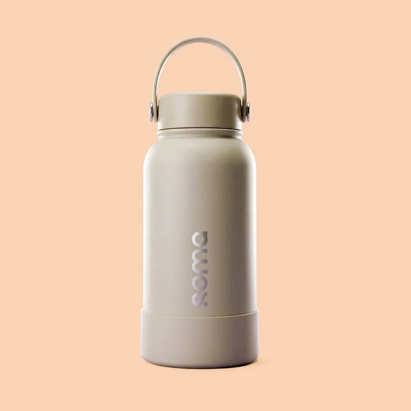 Botella térmica Soma con asa, diseño minimalista y acabado mate, ideal para mantener bebidas frías o calientes.